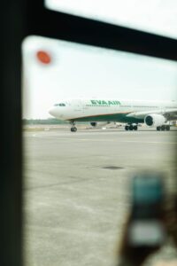 An eva air plane is on the runway.