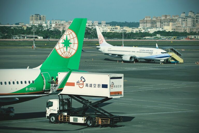 A large jetliner sitting on top of an airport tarmac